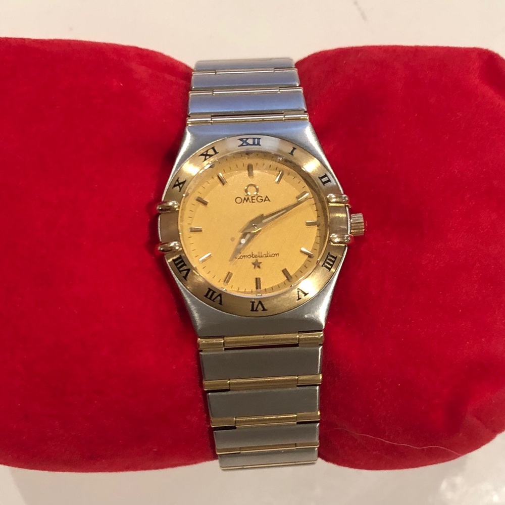 Omega Constellation watch. Gold face
